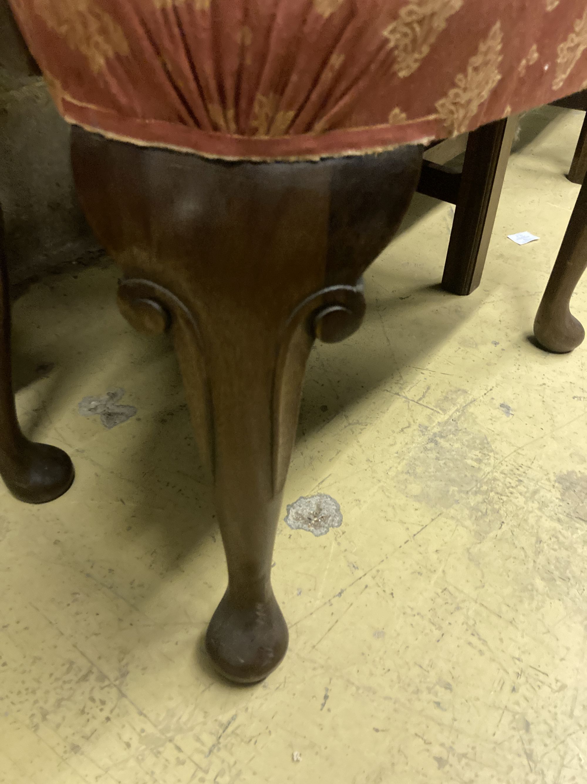 A pair of George I style upholstered mahogany dining chairs (one with arms), width 64cm depth 64cm height 110cm